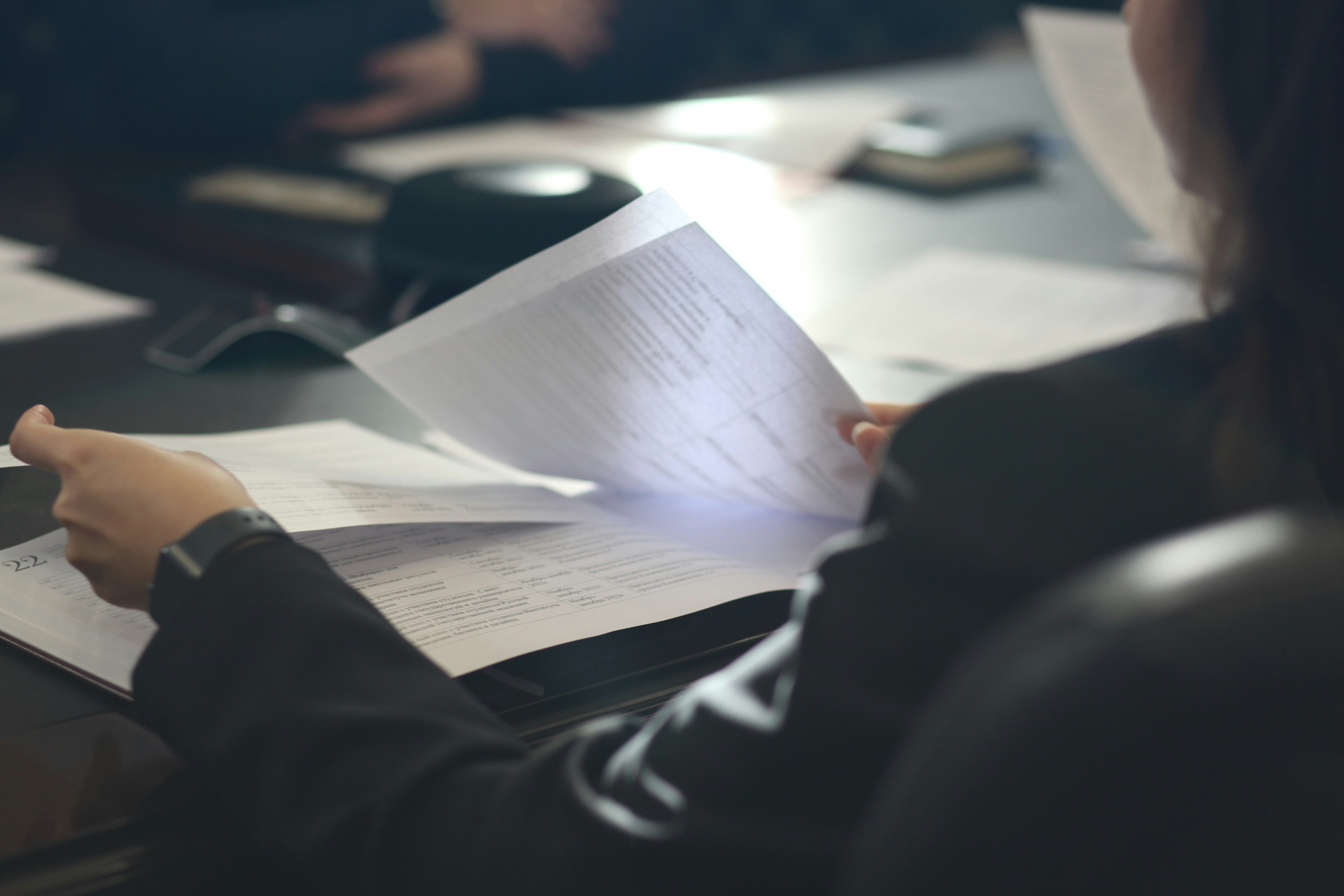 Employee looking through paperwork